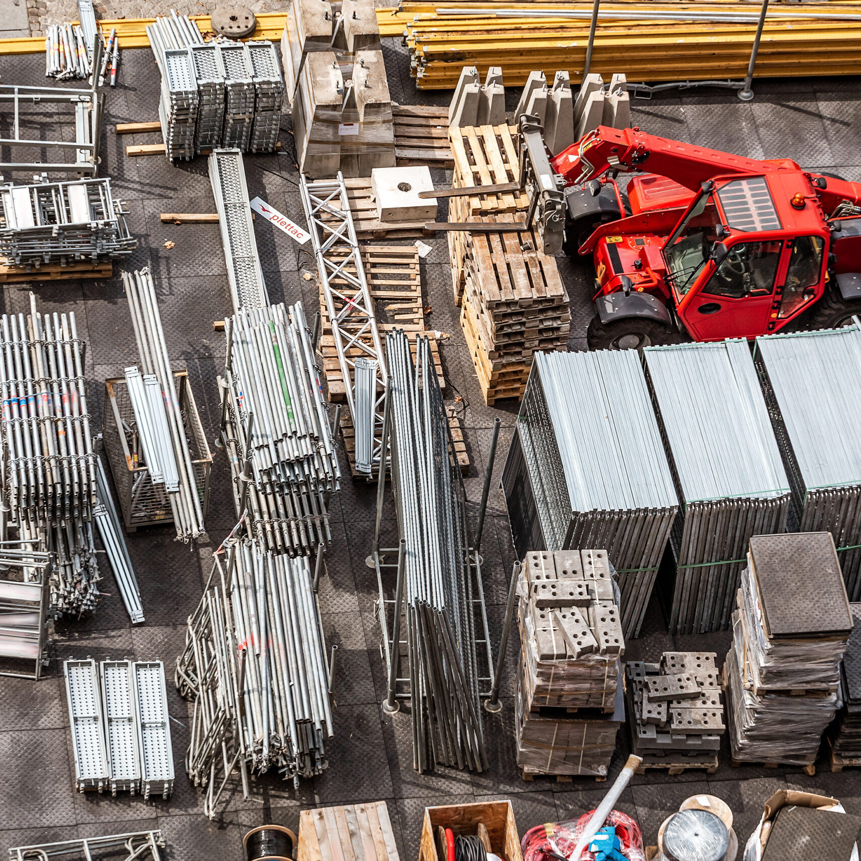 Aerial view of construction site with iron scuffolders